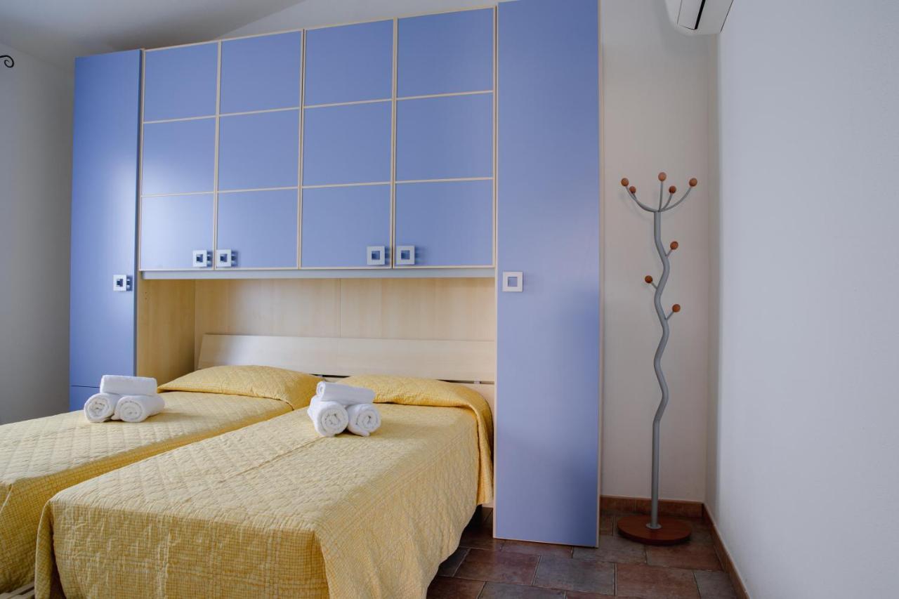 Le Residenze Di Baia Sant'Anna Villa Tanaunella Luaran gambar